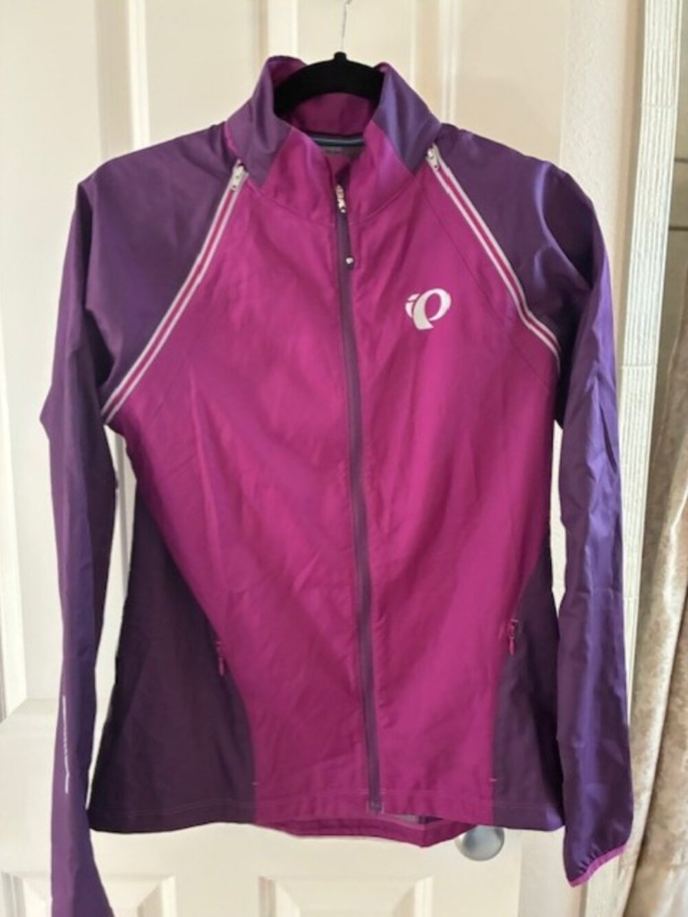 Excellent condition Pearl Izumi lightweight convertible cycling jacket womens L